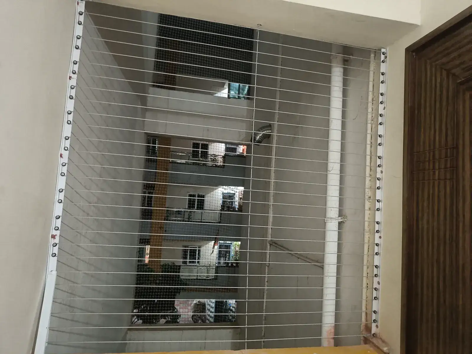 Invisible Grills installed by Dhanush Safety Nets