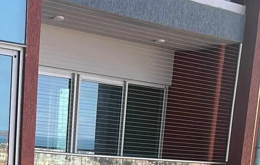 Window Invisible Grills installed by Dhanush Safety Nets