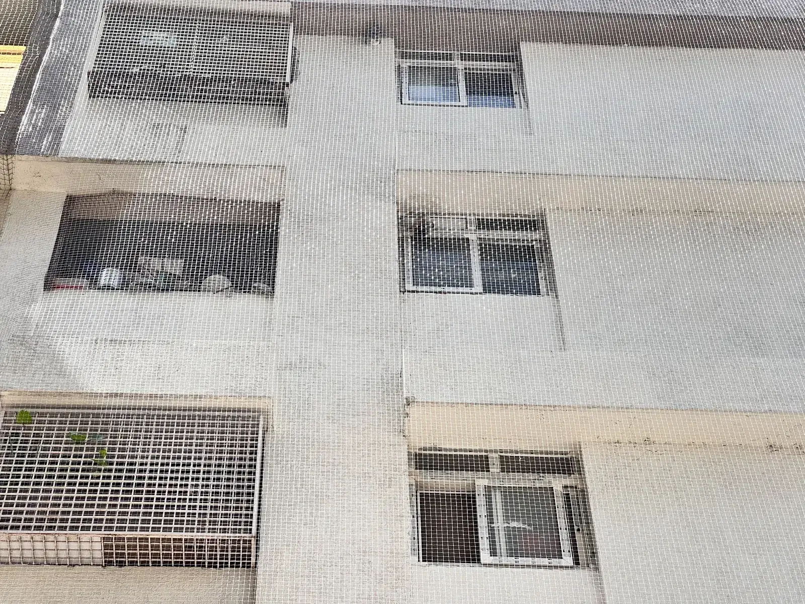 Building Pigeon Nets installed by Dhanush Safety Nets