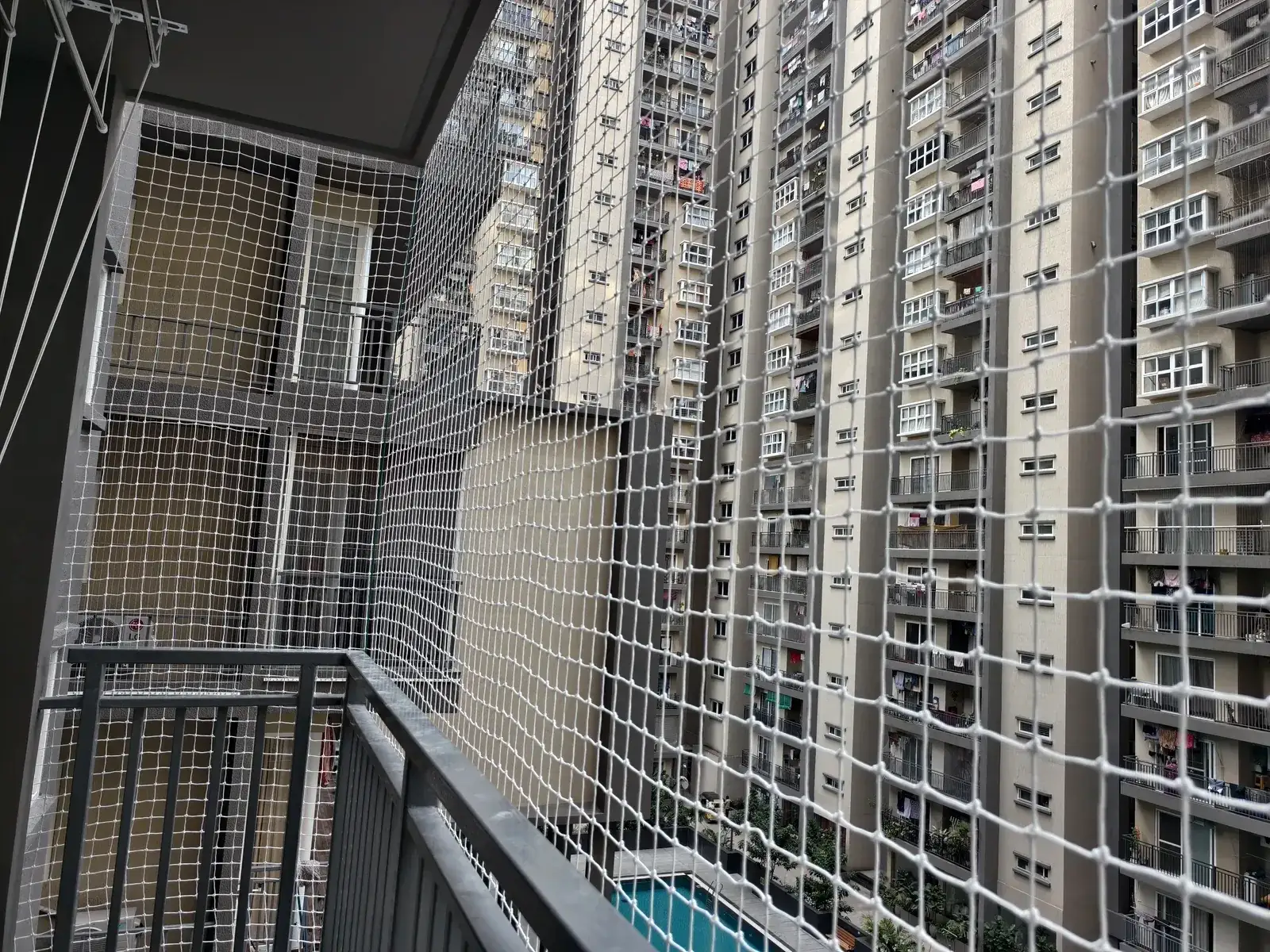 Safety net installed on an apartment balcony by Dhanush Safety Nets